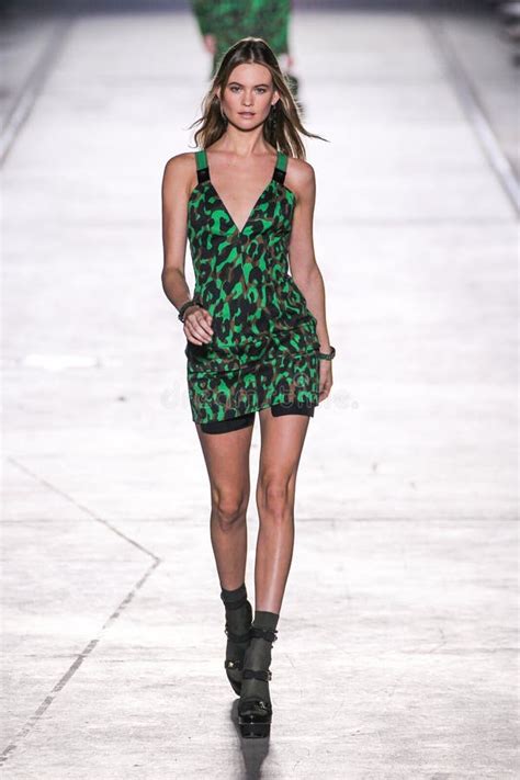 Behati Prinsloo walks the runway during the Versace show as a 